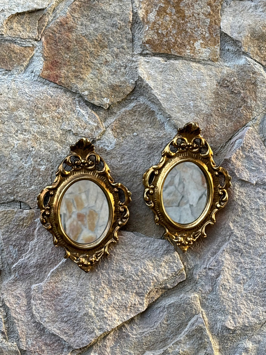 Coppia di specchi vintage con cornici in legno dorate